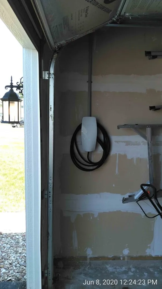 Professional electrician providing panel upgrade in , 