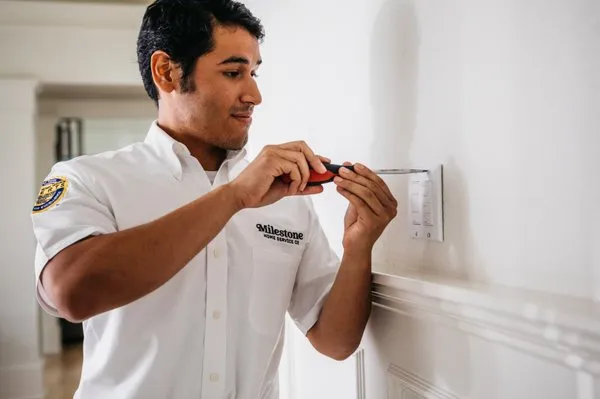 Milestone Electric, A/C, & Plumbing Logo