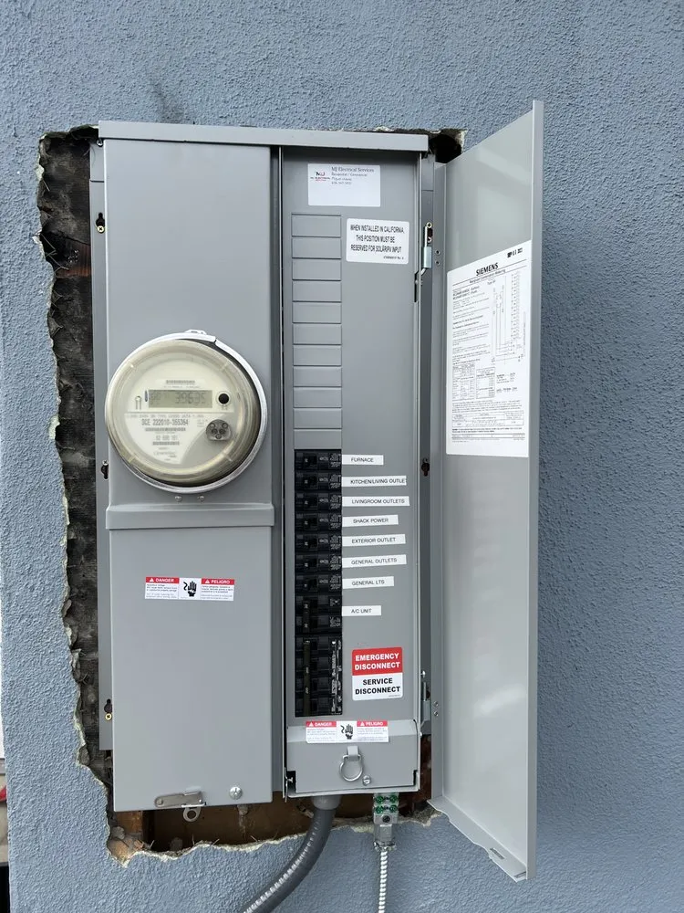 Slide of MJ Electrical Services