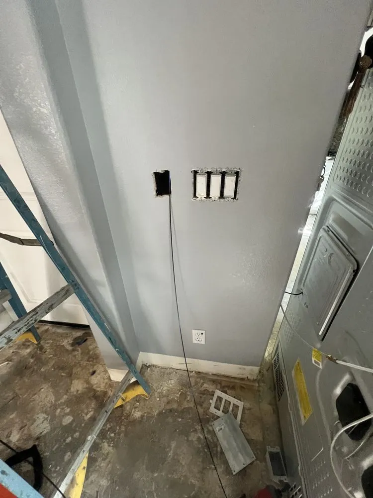 Licensed electrician providing panel upgrade in , 