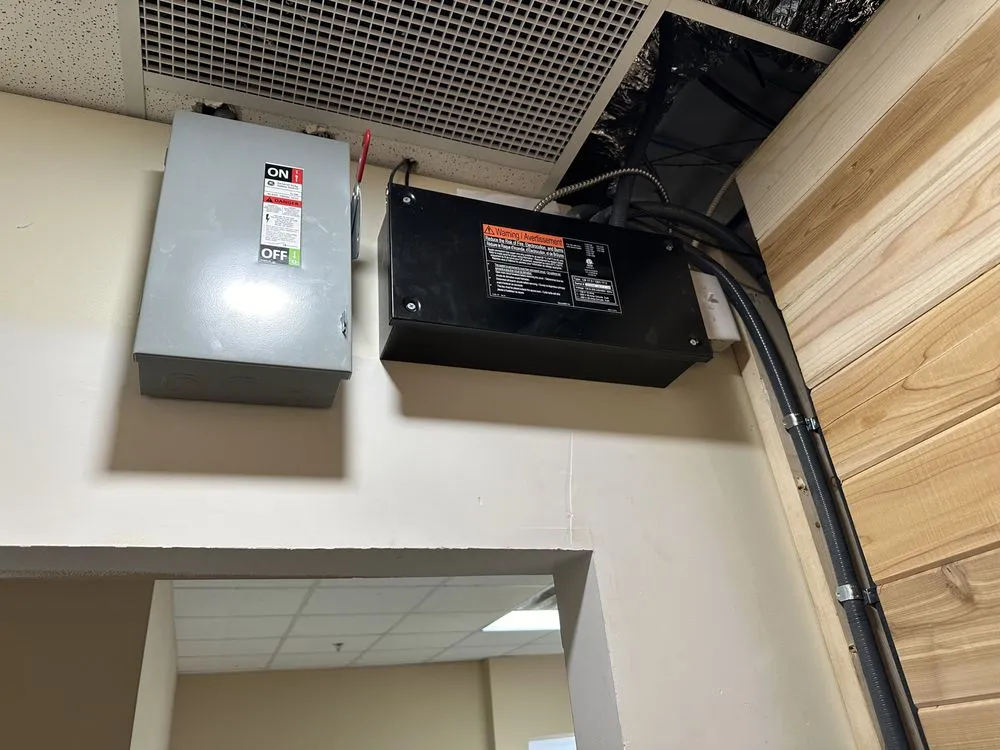 Slide of ML Electrical and Garage Doors