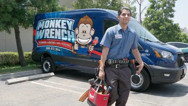 Monkey Wrench Plumbing, Heating, Air & Electric Logo