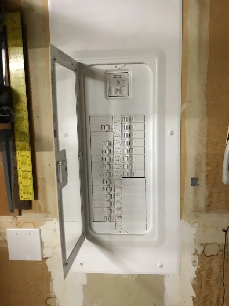 Licensed electrician providing panel upgrade in , 