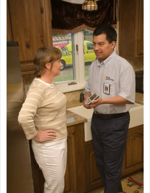 Professional electrician providing panel upgrade in ,