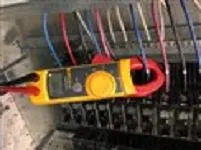 Slide of Mr. Electric of the North Shore