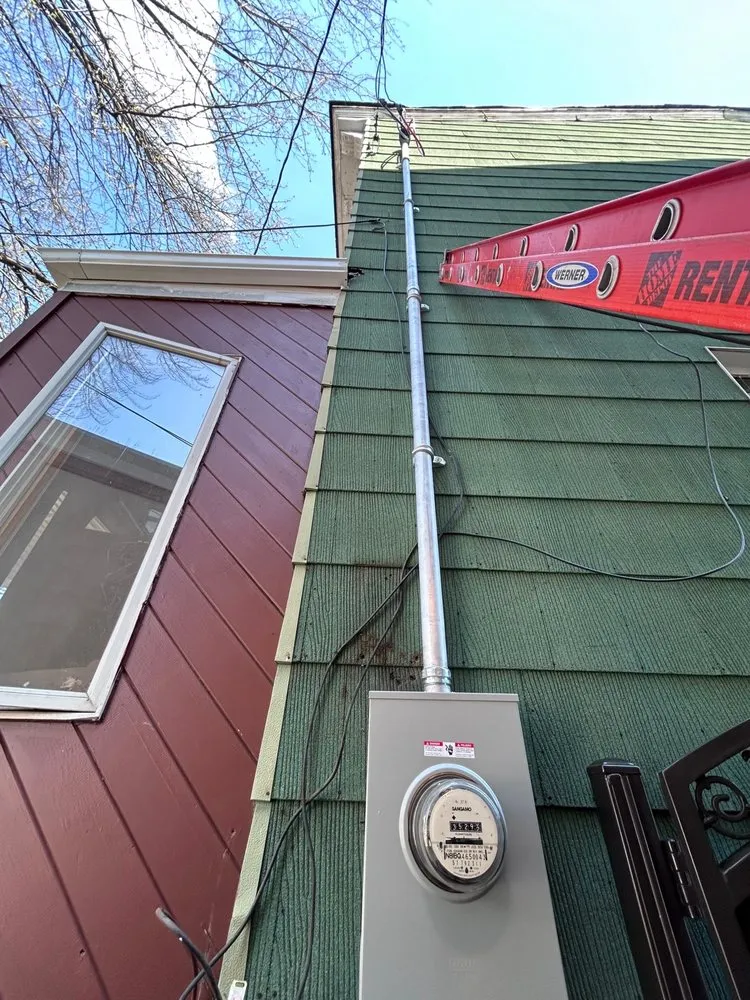 Certified electrician providing panel upgrade in , 