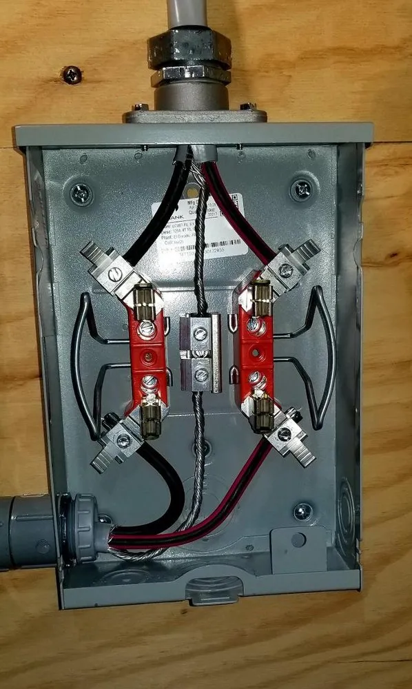 Emergency electrician providing panel upgrade in , 