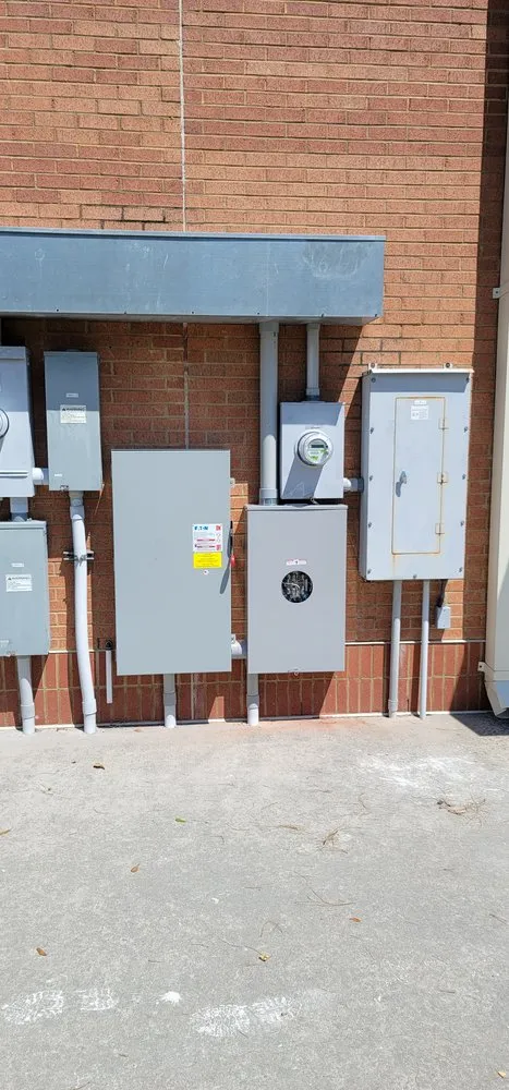 Professional electrician providing panel upgrade in , 