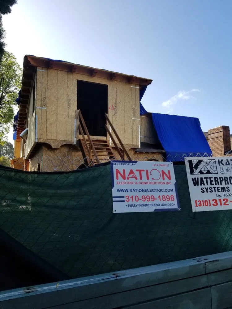 Slide of Nation Electric and Construction