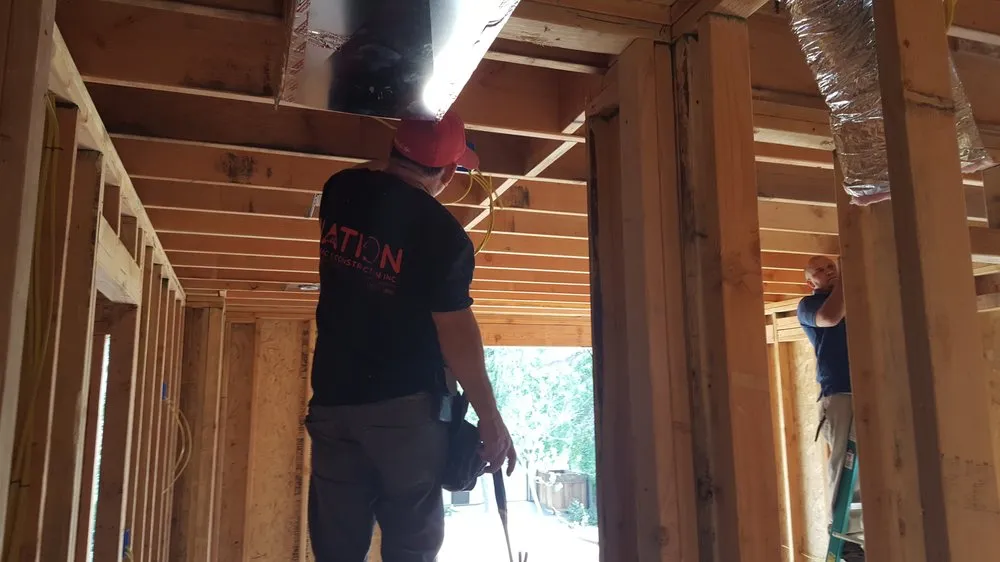 Slide of Nation Electric and Construction