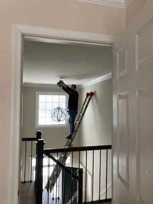 New Age Electric Service Logo