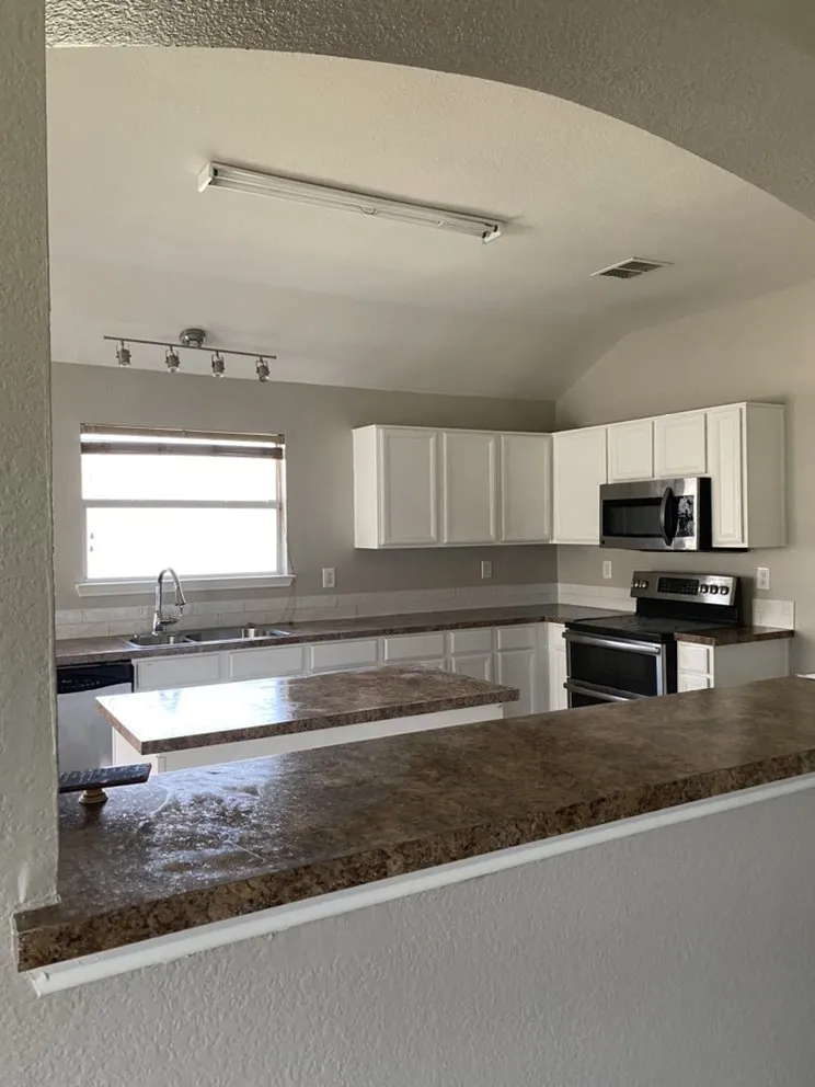 Slide of New Image Renovations DFW