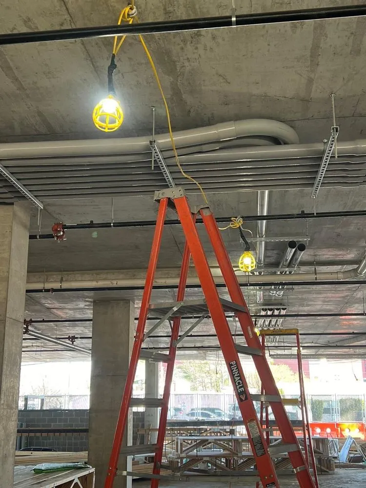 Professional electrician providing panel upgrade in ,