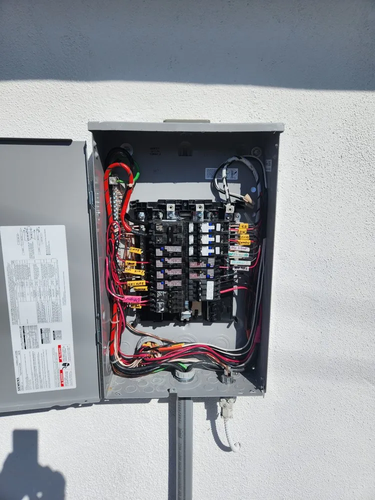 Professional electrician providing emergency electrical service in , 