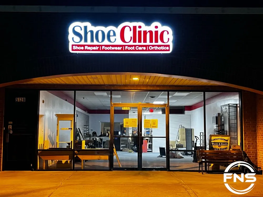 Slide of Nova Sign Guys