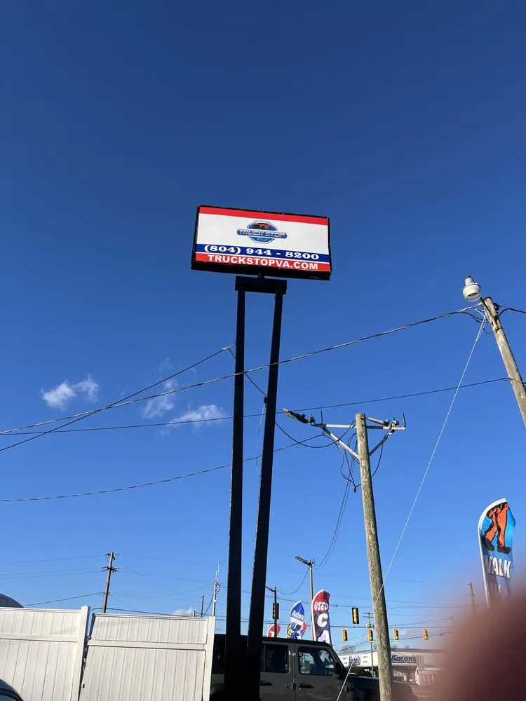 Slide of Nova Sign Guys