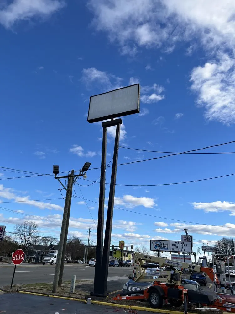 Slide of Nova Sign Guys