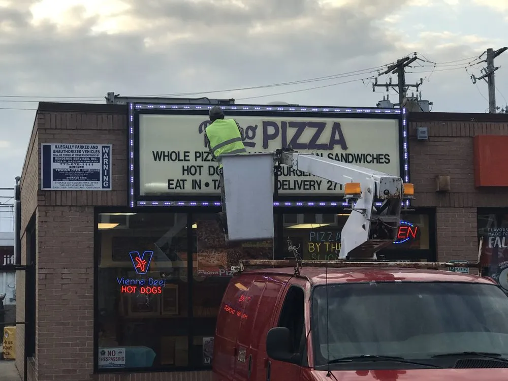 Slide of Nuer Lighting & Signs