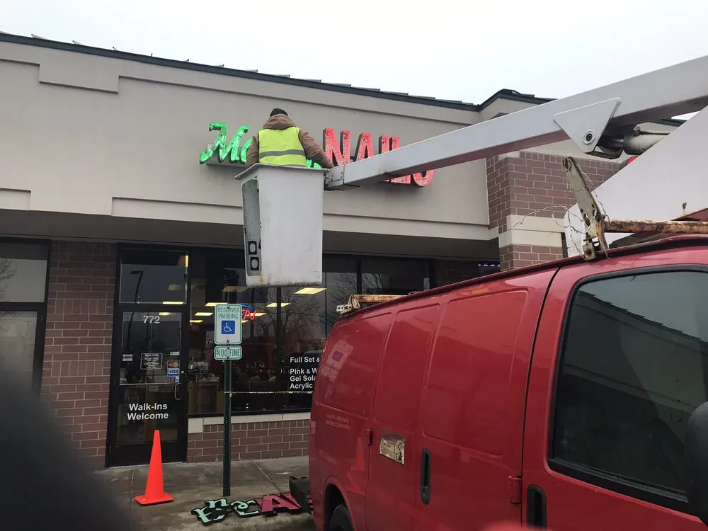 Slide of Nuer Lighting & Signs