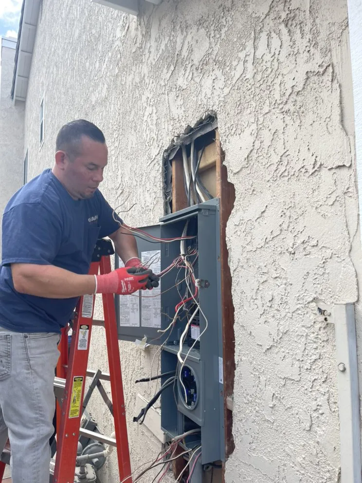 Professional electrician providing wiring installation in ,