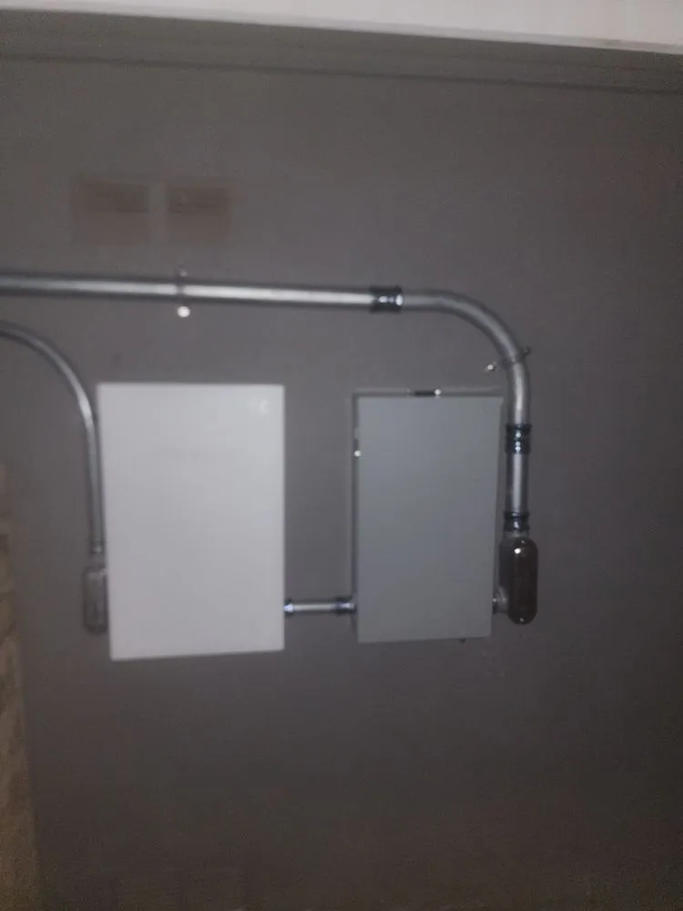 Slide of Olatunji Electric & Solar