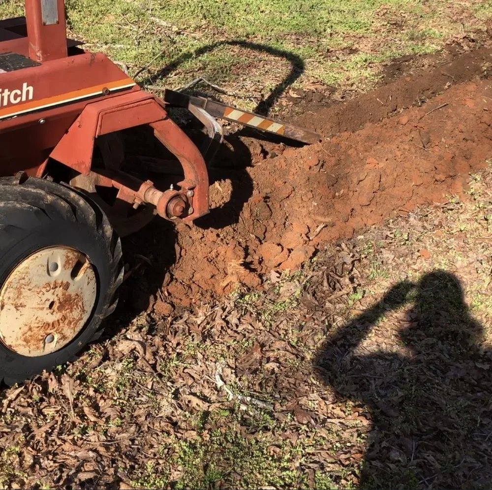 Slide of Olin’s Trenching Service