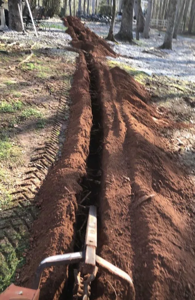 Slide of Olin’s Trenching Service