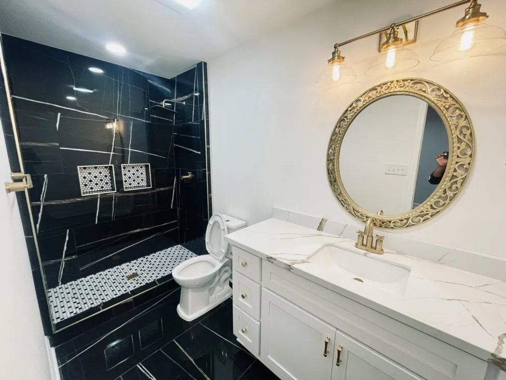 Slide of Olman’s Electrical Services