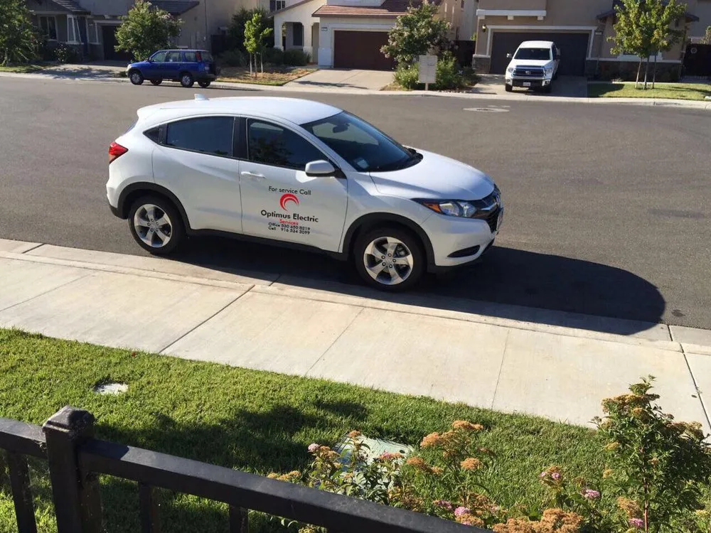 Slide of Optimus Electric Services