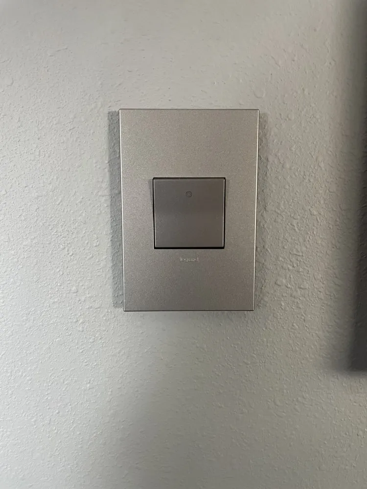 Professional electrician providing panel upgrade in ,