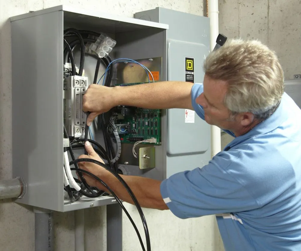 Professional electrician providing panel upgrade in , 