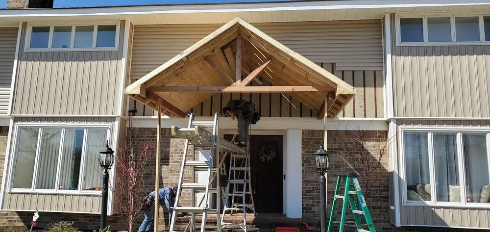 Slide of PG Roofing & Construction