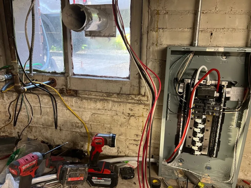 Professional electrician providing outlet and switch repair in , 