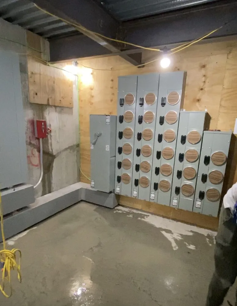 Emergency electrician providing panel upgrade in ,