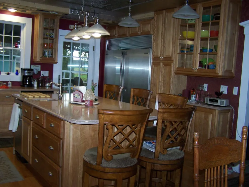 Reliable electrician providing outlet and switch repair in Newport Center, VT - Pro Quality Cabinets