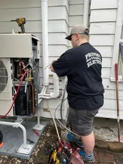 Licensed electrician providing panel upgrade in , 