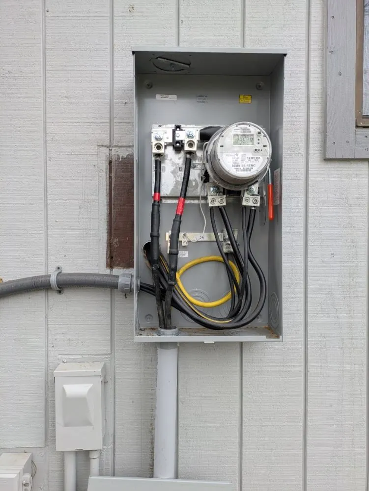 Slide of QEI Electrical Services