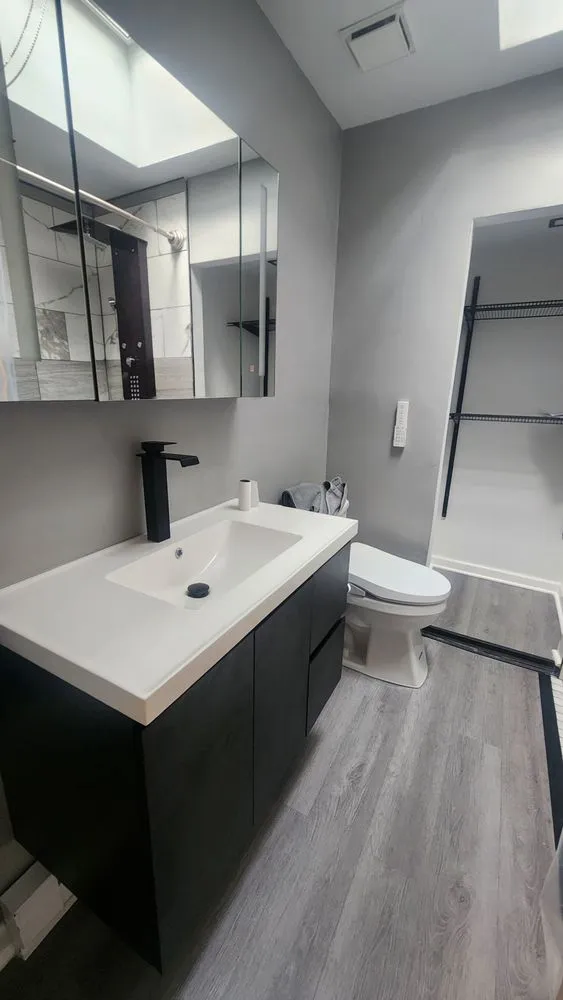 Emergency electrician providing panel upgrade in , 