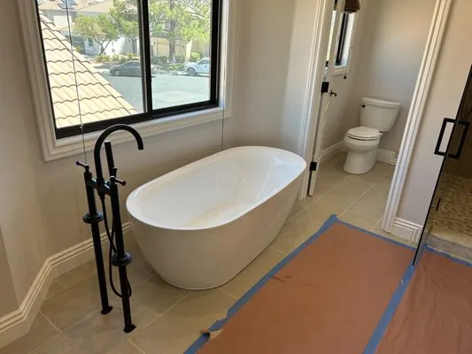 R W Turk Construction Logo