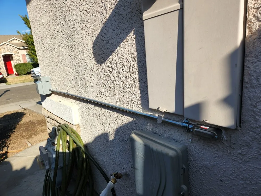 Professional electrician providing panel upgrade in , 