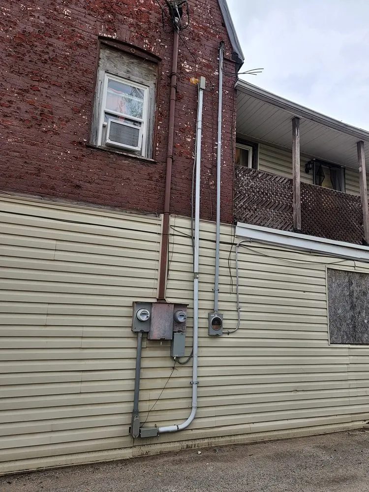 Expert electrician providing panel upgrade in ,