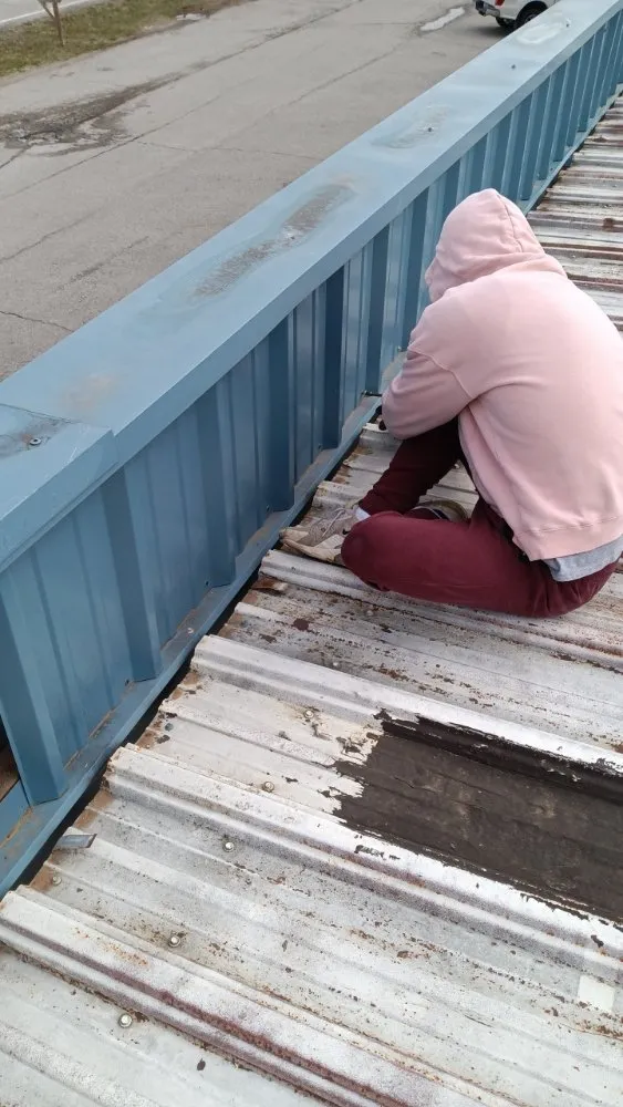 Slide of Ramsey Roofing and Handyman Service