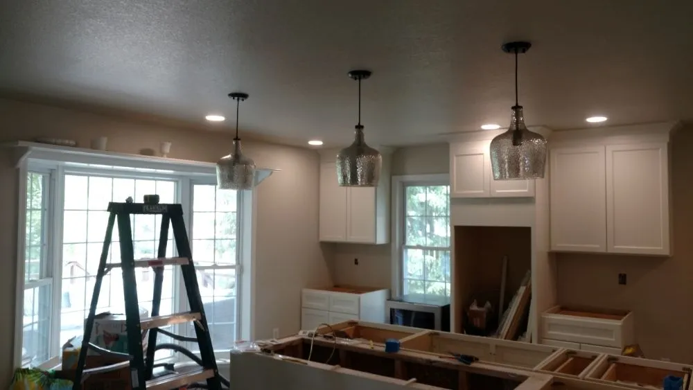 Emergency electrician providing panel upgrade in ,