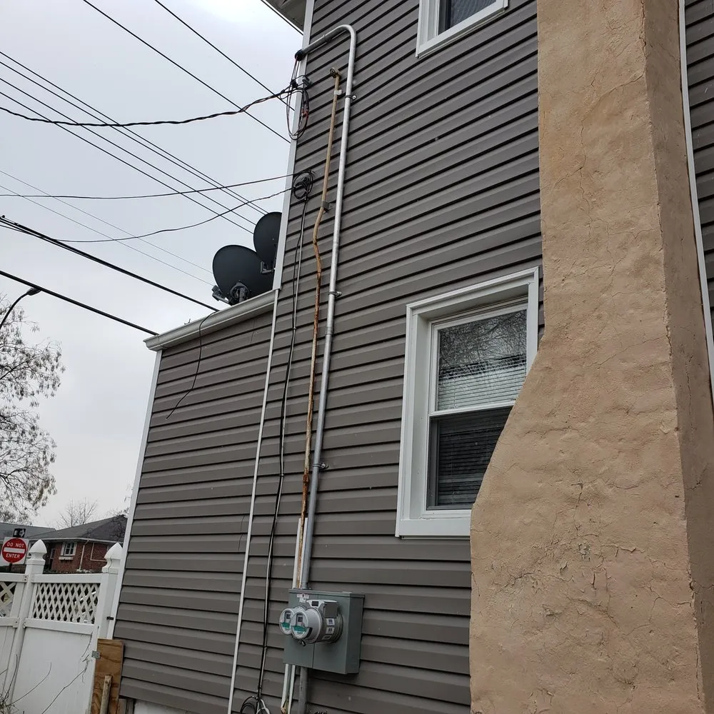 Professional electrician providing circuit breaker repair in Fresh Meadows, NY - Reliant Power Systems
