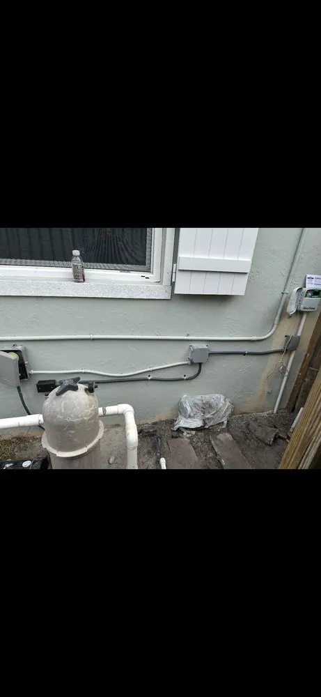 Slide of Rex and Raptors Electrical Service