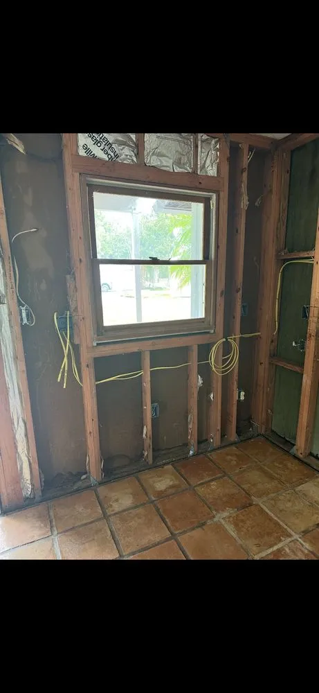 Slide of Rex and Raptors Electrical Service