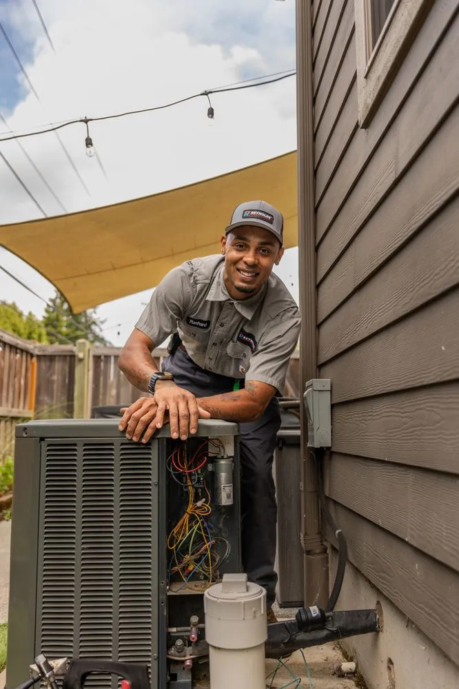 Slide of Reynolds Electric, Plumbing, Heating and Air