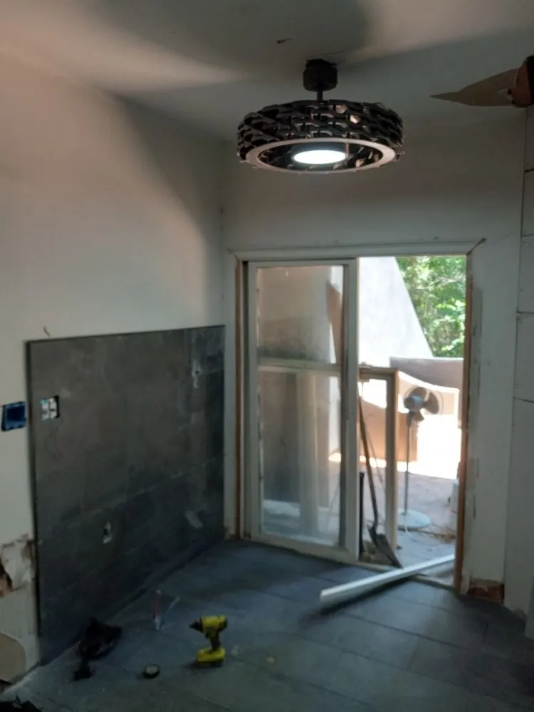 Licensed electrician providing panel upgrade in , 