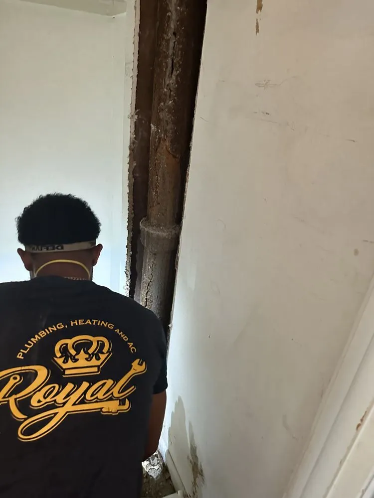 Professional electrician providing circuit breaker repair in Glen Mills, PA - Royal Plumbing Heating & Ac