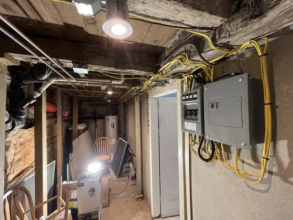 Certified electrician providing panel upgrade in , 